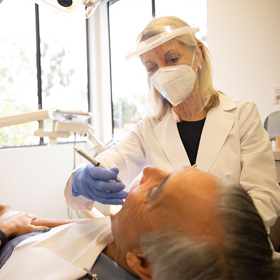 Dentist treating dental patient