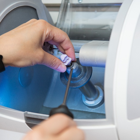 Dentist using CEREC machine