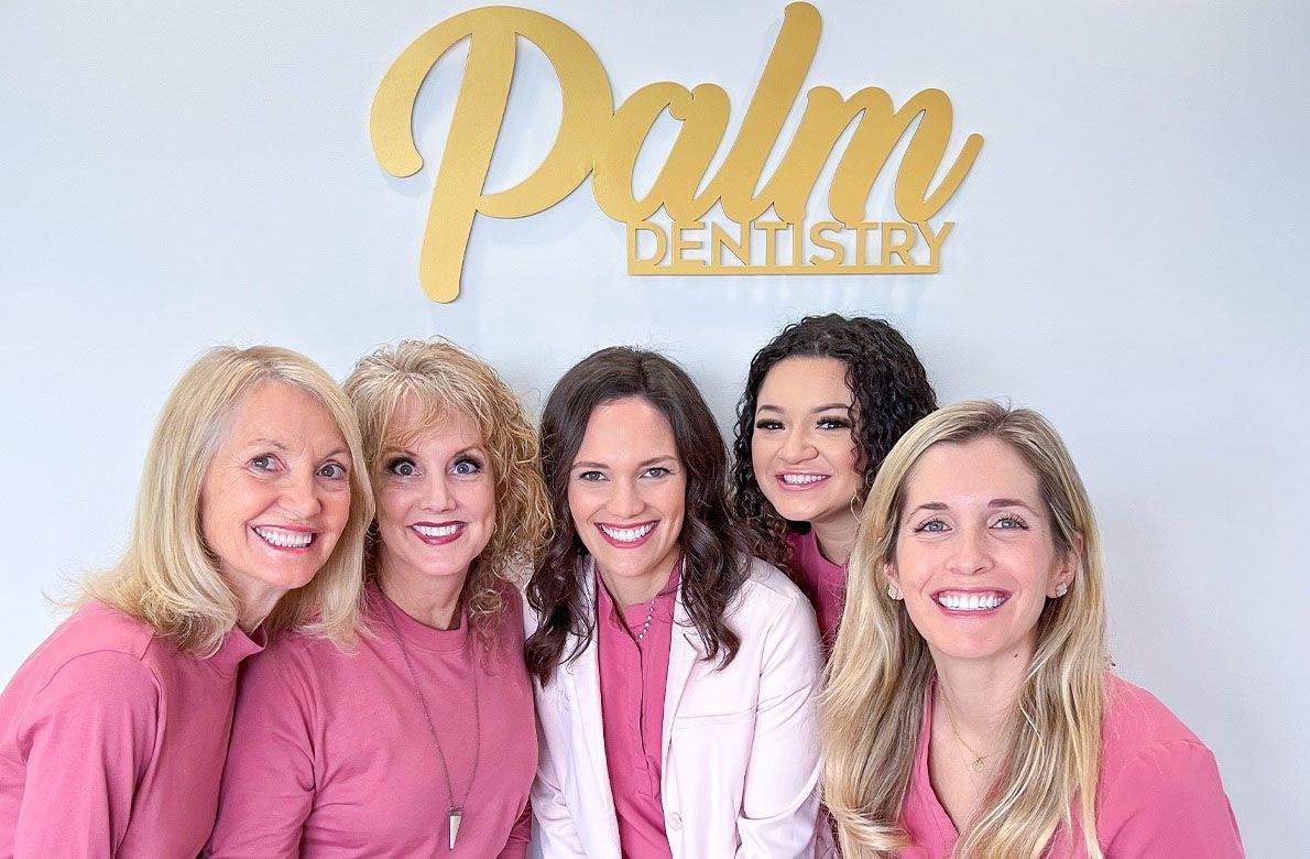 Smiling dental team members at Palm Dentistry in Mission Viejo