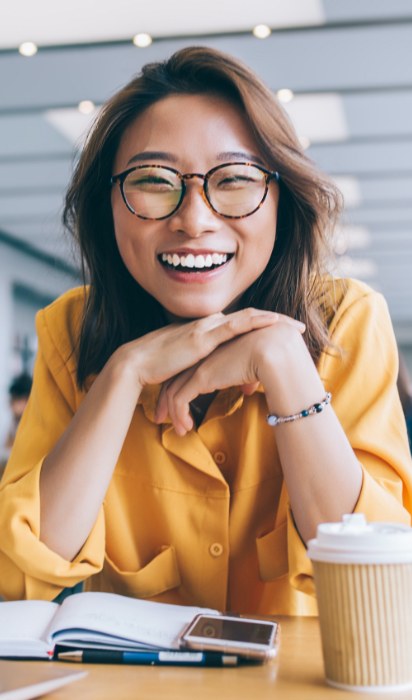 Woman with healthy smile after preventive dentistry