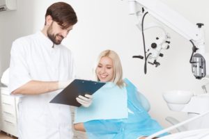 woman talking to dentist