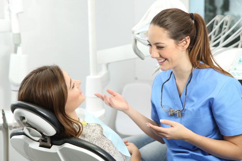 dentist speaking to patient about getting a CEREC crown