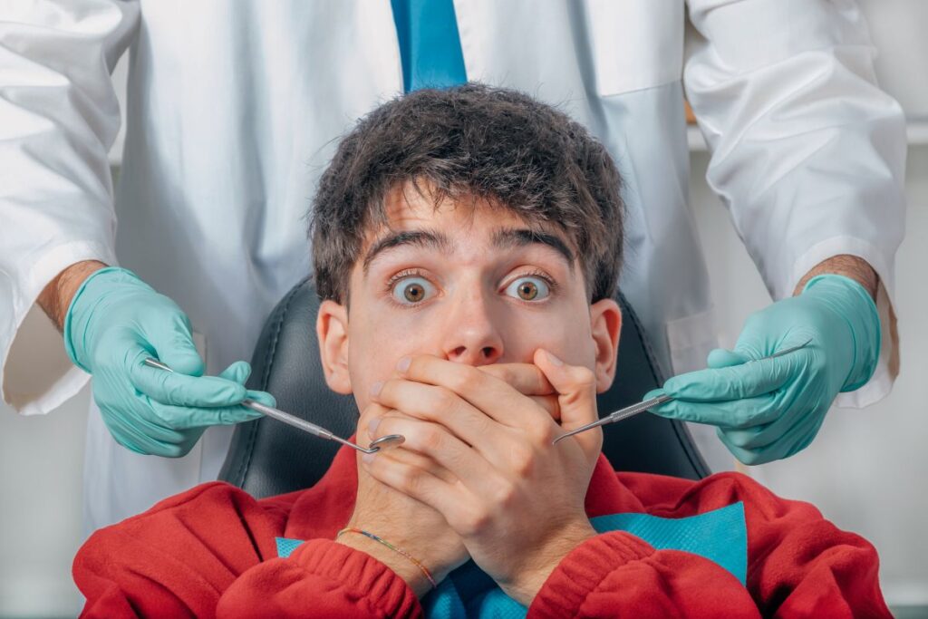 A scared man at a dental appointment