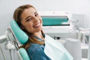 Woman smiling after her root canal